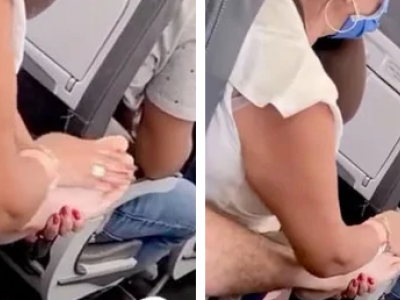 I peggiori comportamenti in aereo: passeggera massaggia il piede ad un altro. 